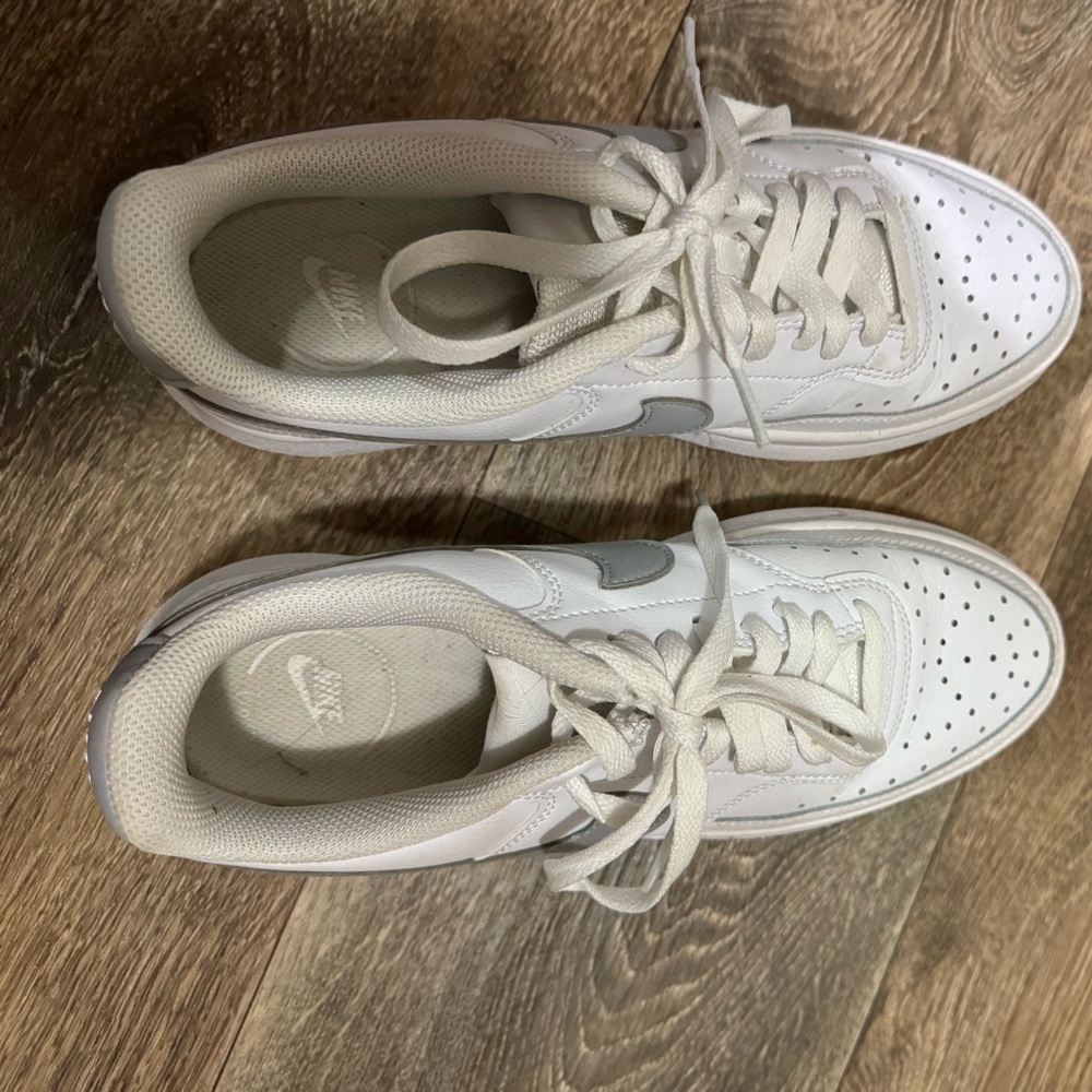 Authentic Nike sneakers. Well loved, but will clean up nicely.